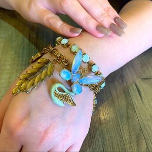 Authentic Juicy Couture one of a kind with bracelets with beautiful charms 🦋🦢